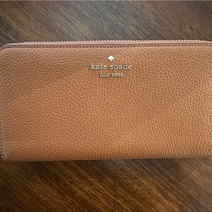 kate spade New York Pebbled Leather Zip Wallet in brown